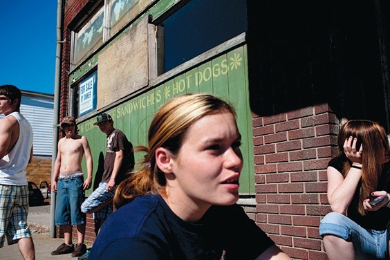 Lisa Russel, 20, and other teens hang out on a street corner in Glouster, Ohio. Once a thriving community in Southeastern Ohio, the departure of extractive industries such as coal mining have caused the town’s economy to dry up. Glouster’s youth have little to do and substance abuse runs rampant.