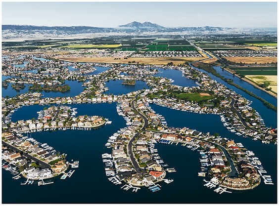 California, USA, 2009

As developments such as Discovery Bay increase in the Sacramento-San Joaquin Delta, so does the flood hazard. More than a million people now live behind delta levees, which are susceptible to increasingly severe coastal storms.