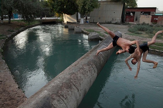 Tajikistan, 2009

Launching themselves off a drainage pipe, young men in a village in southwestern Tajikistan cool off in the only swimming hole around: an irrigation canal.