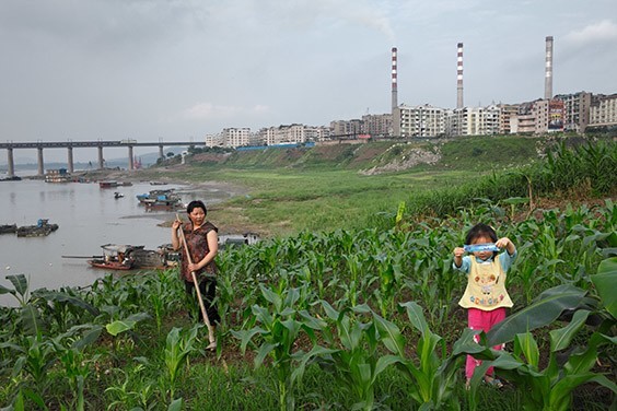 China, 2009

In Chongqing—a burgeoning Chinese municipality whose 31 million people tap the Yangtze River for their needs—coal-fired, carbon-dioxide-spewing power plants compete with family farms for water.