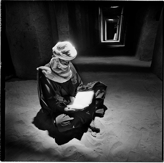 Timbuktu, Mali
A Tuareg man reads the Koran in a mosque. In Timbuktu there remains a repository of thousands of ancient manuscripts, dating to a time when the city rivaled Damascus, Baghdad and Cairo as one of the great centers of Islamic culture and learning.