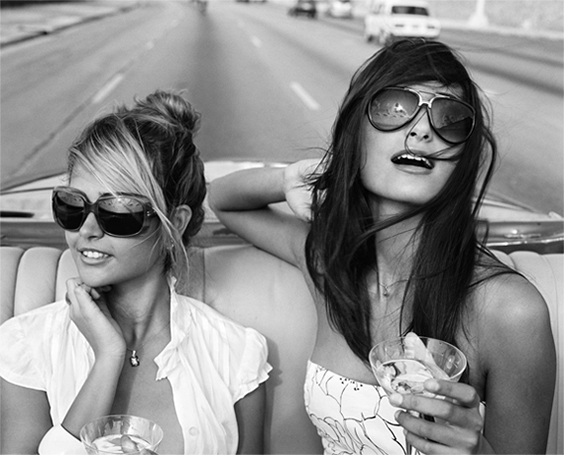 Giselle and Rachel cruising down the Malecón, Havana, from the series Habana Libre, 2009